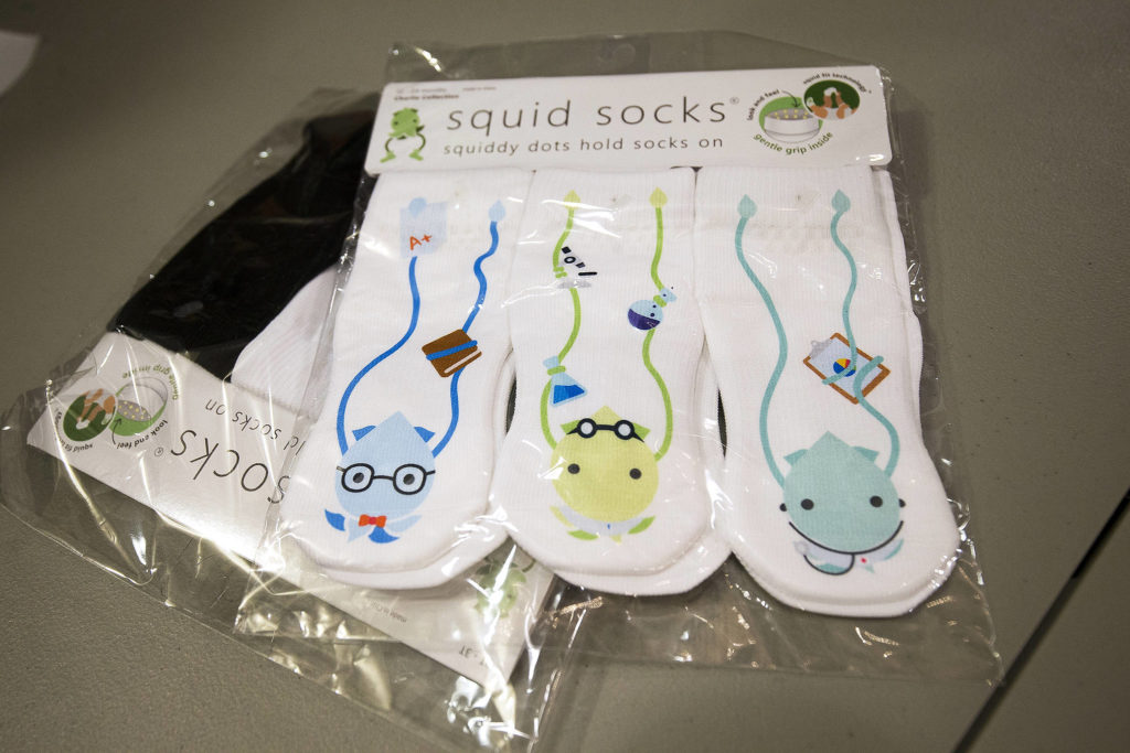 Squids are the main design element of the Squid Socks line of children’s socks. (Andy Bronson / The Herald) 
