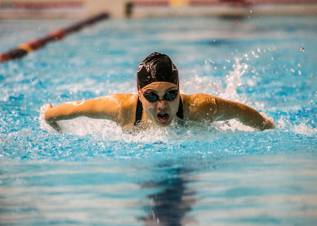 Stanwood High School’s Jetlynn Hau swims the 200 individual medley Nov. 10, 2018, during the 2018 WIAA State Swim & Dive Championships in Federal Way. (Olivia Vanni / The Herald)
