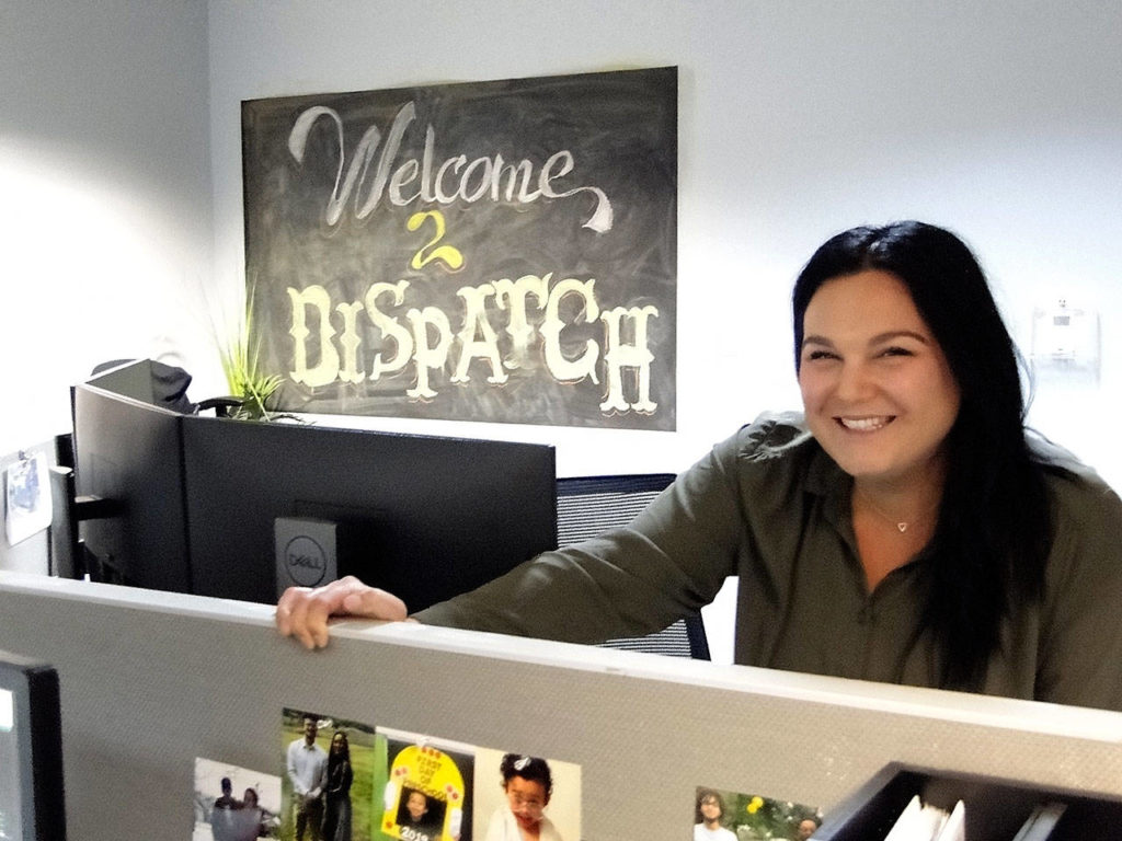 Erin Wakefield is surrounded by 45 people — all talking at the same time — at Waste Management’s Central Dispatch. (Waste Management)
