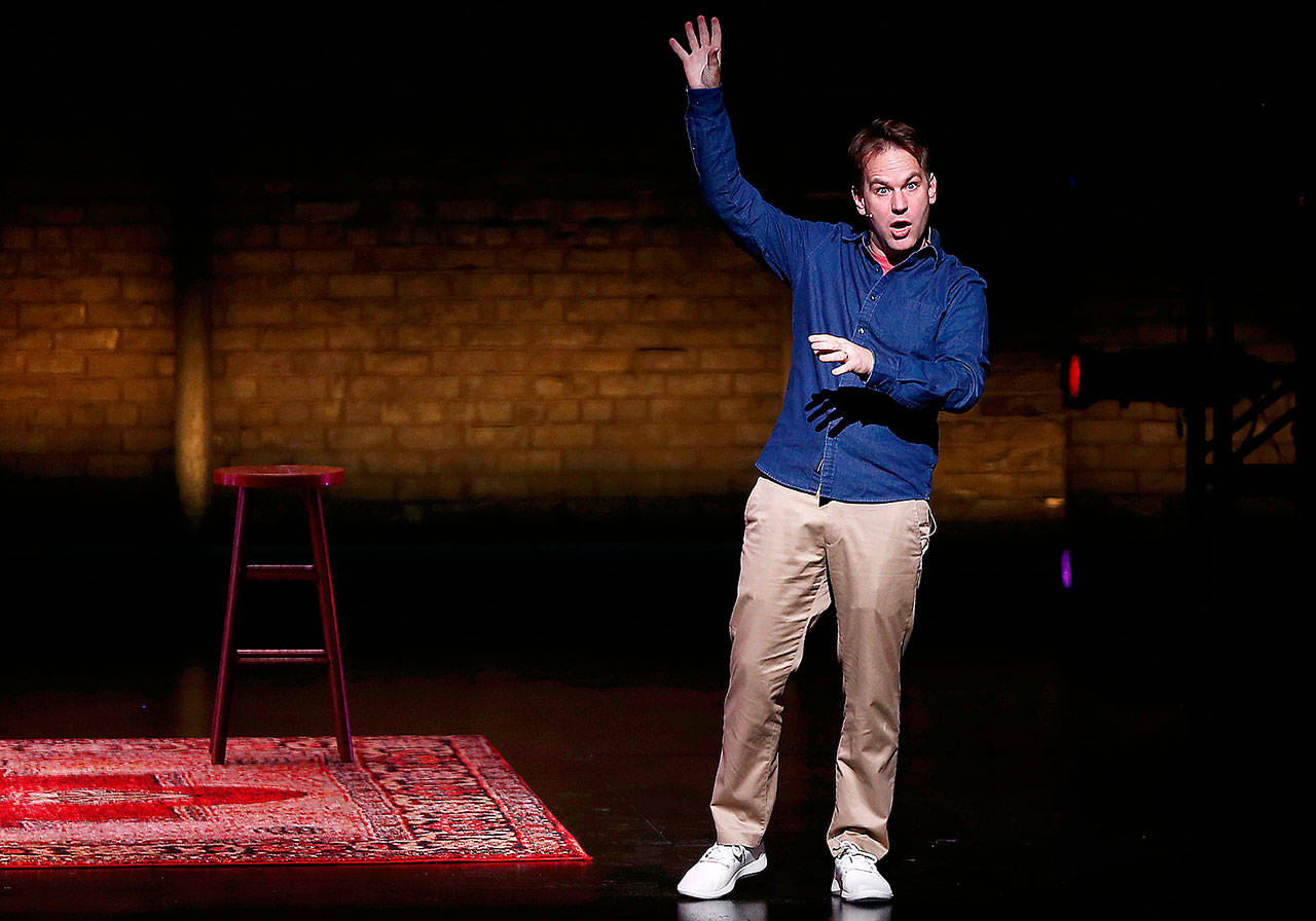 Mike Birbiglia performs his one man show “The New One” at the Ahmanson Theater in Los Angeles on Oct. 23. (Luis Sinco/Los Angeles Times)