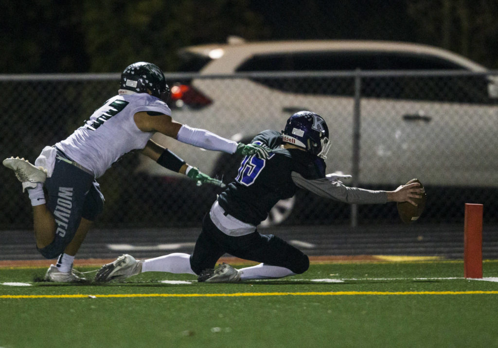 Kamiak’s Wesley Garrett reach for the end zone during the game on Nov. 1, 2019 in Everett, Wash. (Olivia Vanni / The Herald)
