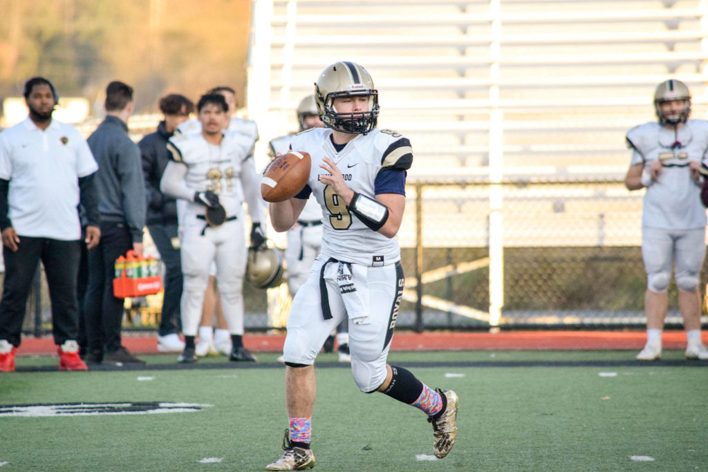 Senior quarterback Nate Killen looks for an open receiver against Marysville Getchell on Friday, Nov. 1 at Quil Ceda Stadium in Marysville. (Katie Webber / The Herald)
