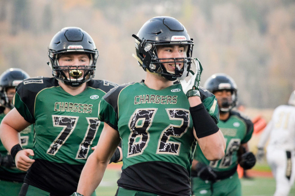 Senior defensive end Dominic Andrews smiles after recovering a fumble for a defensive touchdown against Lynnwood on Friday, Nov. 1 at Quil Ceda Stadium in Marysville. (Katie Webber / The Herald)
