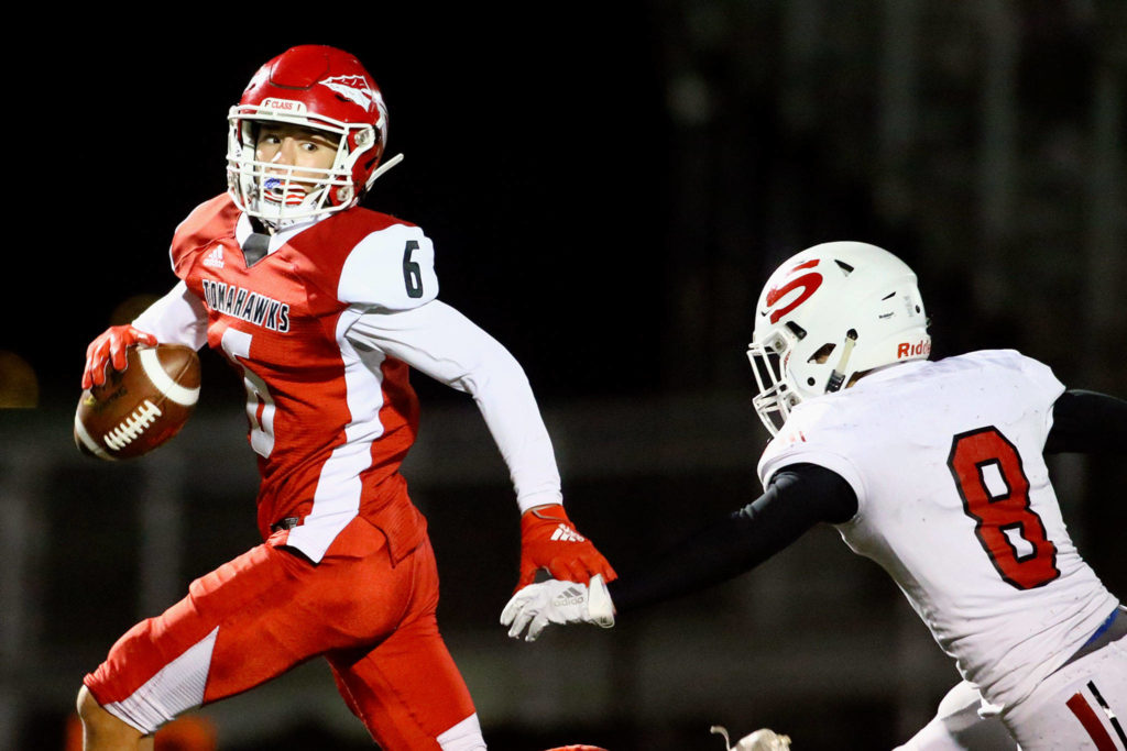 Marysville Pilchuck remained unbeaten with a 52-3 thrashing of Snohomish in the Wesco 3A title game. (Kevin Clark / The Herald)
