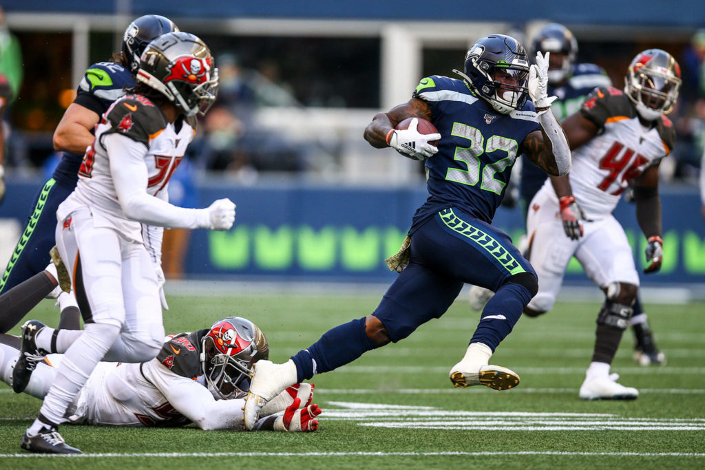 Seahawks Chris Carson rushes against the Buccaneers Sunday afternoon against the Buccaneers at CenturyLink Field in Seattle on November 3, 2019. (Kevin Clark / The Herald)
