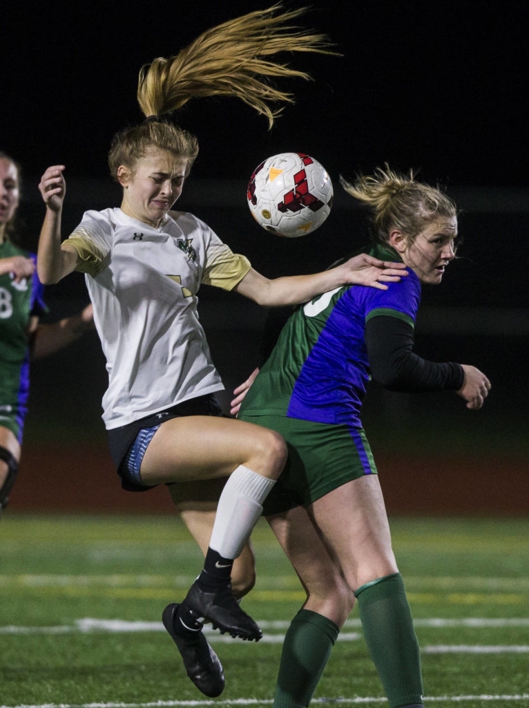 Marysville Getchell’s Jadin Thompson-Sheldon jumps up for the ball during the district semifinal game on Nov. 5, 2019 in Edmonds, Wash. (Olivia Vanni / The Herald)
