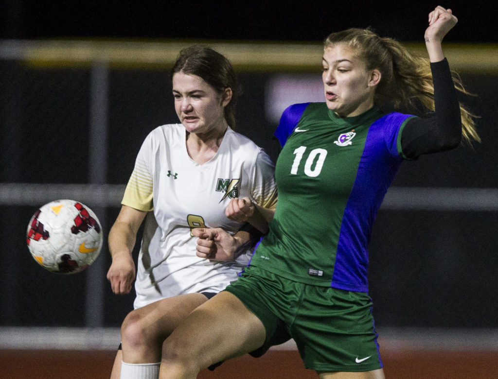 Edmonds-Woodway’s AJ Martineau fights for the ball during the district semifinal game on Nov. 5, 2019 in Edmonds, Wash. (Olivia Vanni / The Herald)
