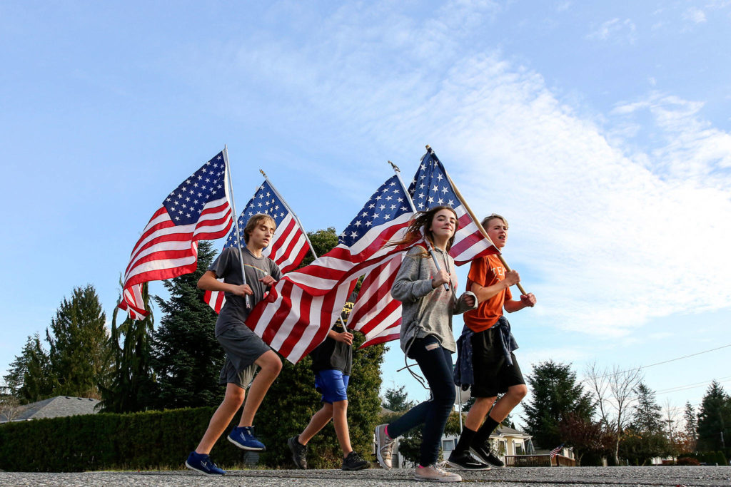 Kids of Granite Falls run in support of veterans mental health and support Friday afternoon in Granite Falls. (Kevin Clark / The Herald)
