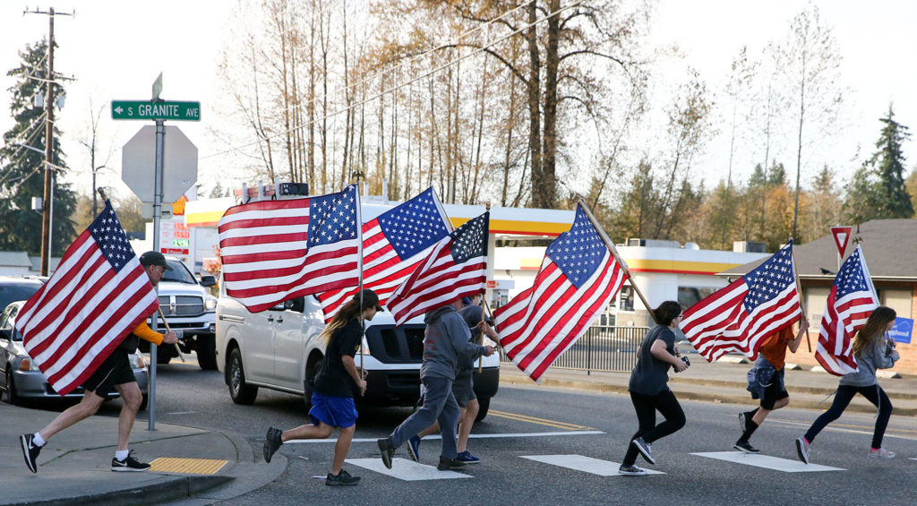 Kids of Granite Falls run in support of veterans mental health and support Friday afternoon in Granite Falls. (Kevin Clark / The Herald)
