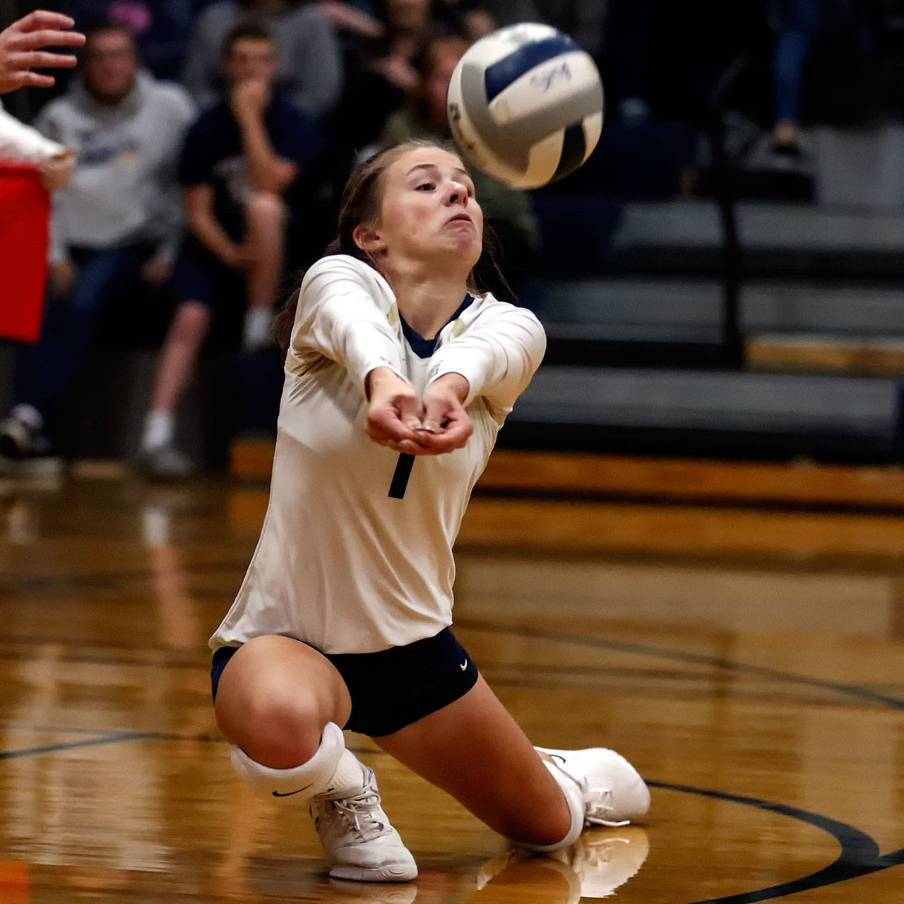 Arlington’s Taylor Helle digs a ball during a Wesco 3A/2A match against Oak Harbor on Oct. 24 at Arlington High School. Helle and the Eagles will play the winner of Thursday’s play-in match between Lynnwood and Squalicum in the 3A Northwest District Tournament next Tuesday at 7 p.m. in Arlington. (Kevin Clark / The Herald)