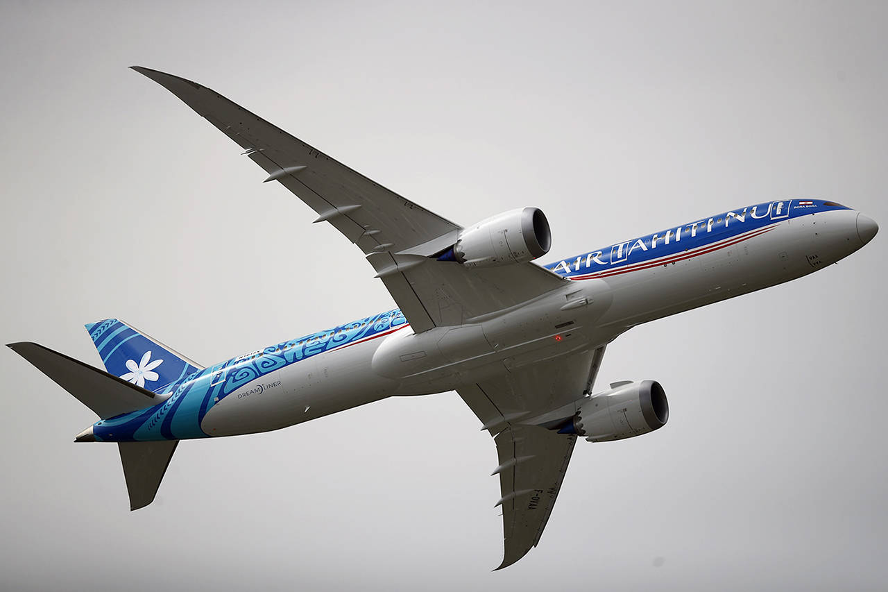 The Boeing 787-9 Dreamliner of Air Tahiti Nui performs a demonstration flight at Paris Air Show, in Le Bourget, north east of Paris, France, on June 18. (AP Photo/ Francois Mori)