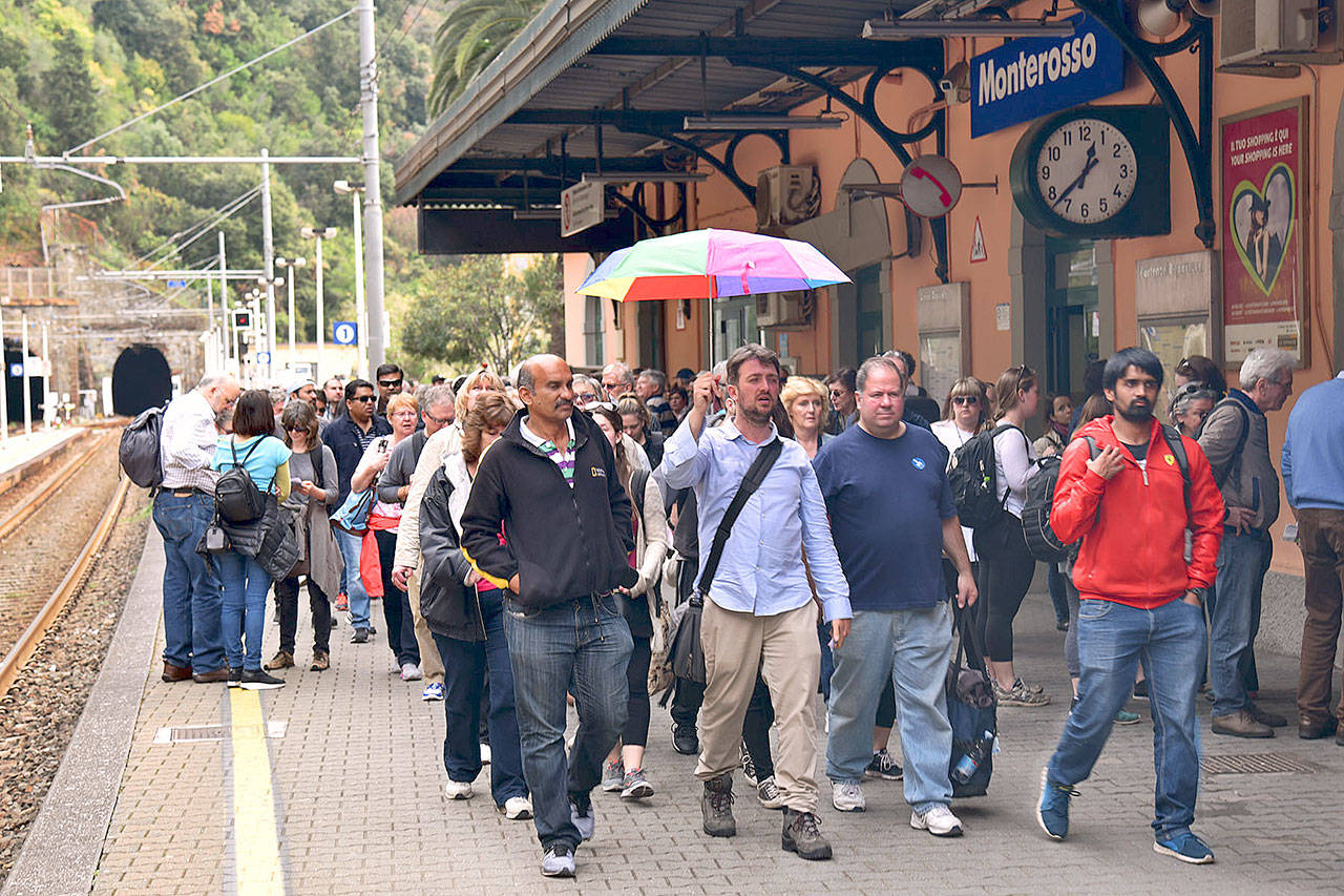 Tour groups can crowd Cinque Terre train platforms in peak season. (Rick Steves’ Europe)