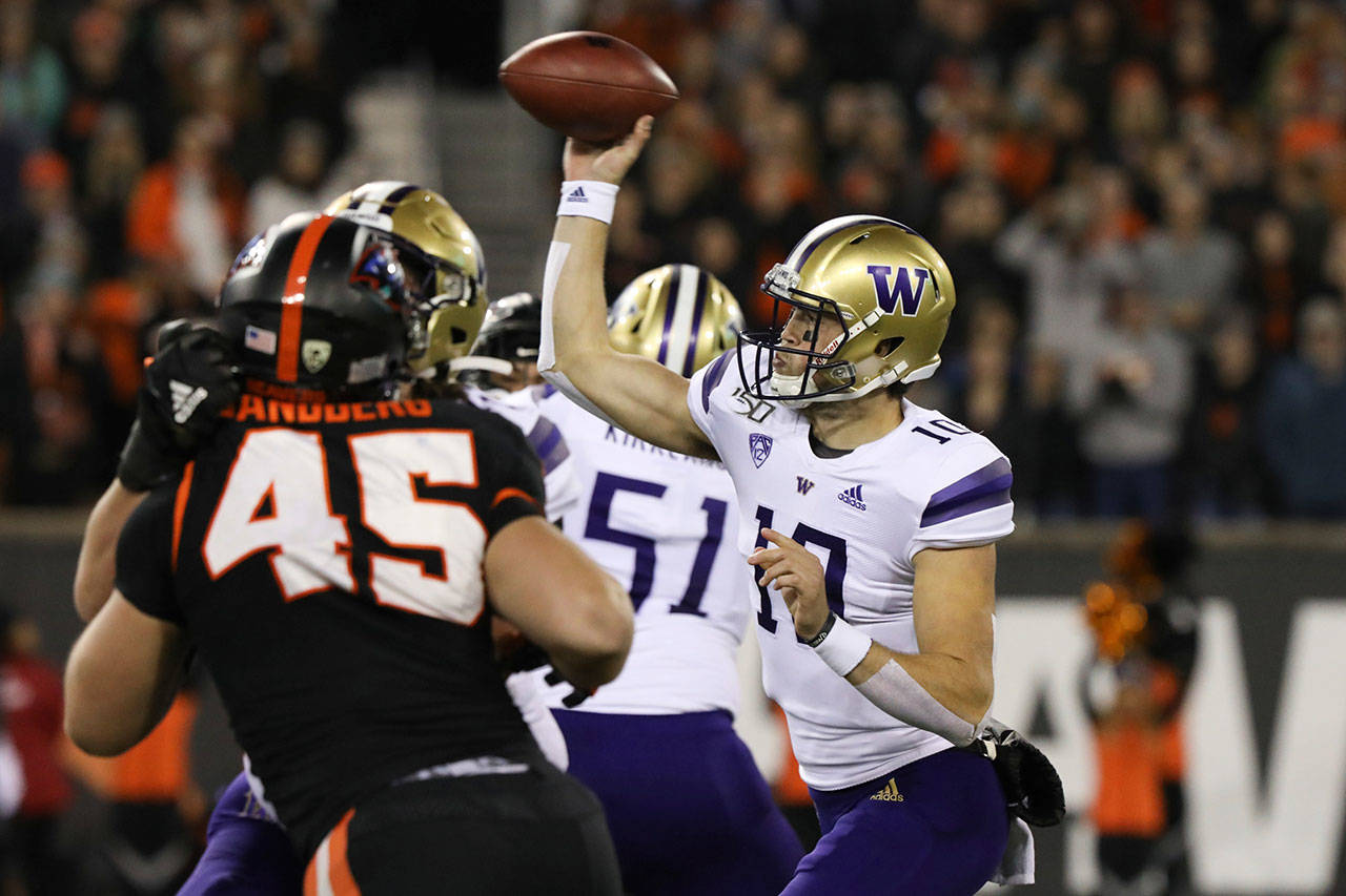 Washington quarterback Jacob Eason (10), a Lake Stevens High School alum, throws a pass during the first half of a game against Oregon State Friday in Corvallis, Ore. (AP Photo/Amanda Loman)