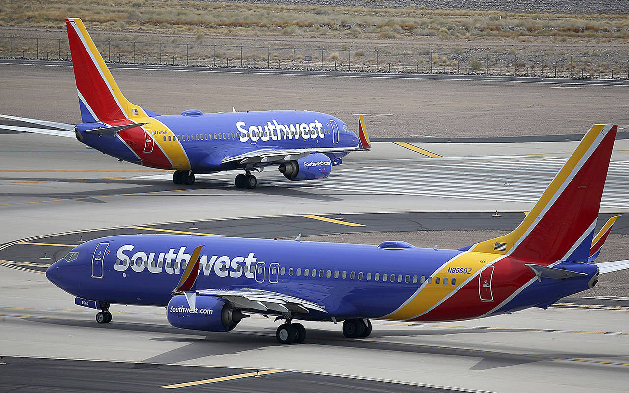 This July 17 photo shows Southwest Airlines planes at Phoenix Sky Harbor International Airport in Phoenix. (AP Photo/Ross D. Franklin)