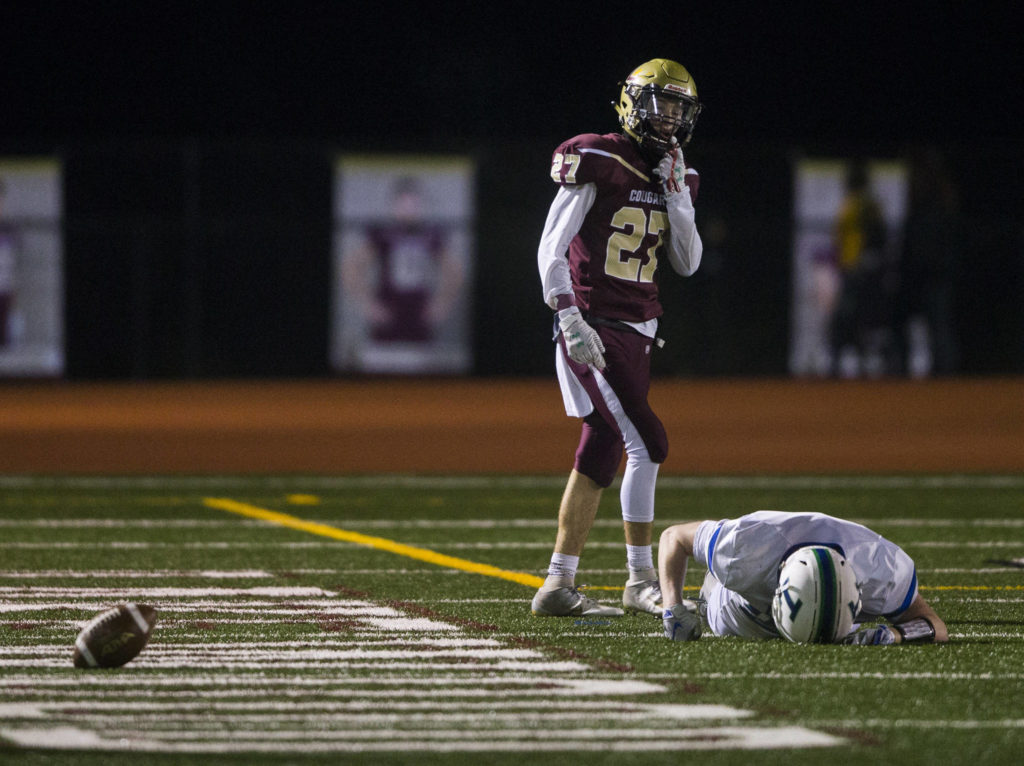 A Liberty player punches the ground after he misses a throw during a 2A playoff game against Liberty on Nov. 8, 2019 in Arlington, Wash. (Olivia Vanni / The Herald)
