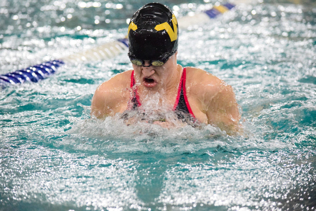 Lake Stevens’ Cheyenne Kreide swims in the girls 100 yard breaststroke of the 4A Girls Northwest District Championship on Nov. 9 at the Snohomish Aquatic Center. Cheyenne won with a time of 1:05.62. (Katie Webber / The Herald)
