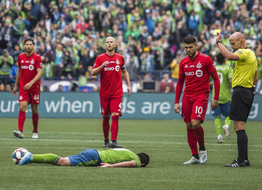 A yellow card is given to Toronto midfielder Alejandro Pozuelo after a tackle during the MLS Cup on Nov. 10, 2019 in Seattle, Wash. (Olivia Vanni / The Herald)
