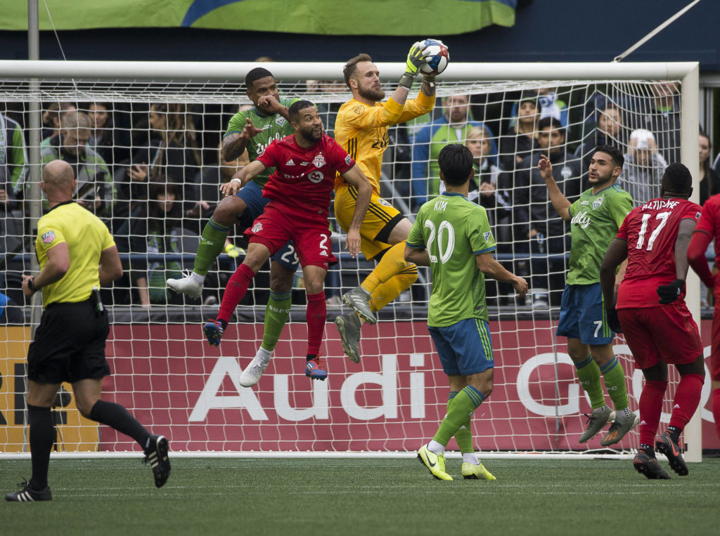 Sounders goalkeeper Stefan Frei makes a save as the Seattle Sounders beat Toronto FC 3-1 to win the MLS Cup at CenturyLink Field on Sunday, Nov. 10, 2019 in Seattle, Wash. (Andy Bronson / The Herald)
