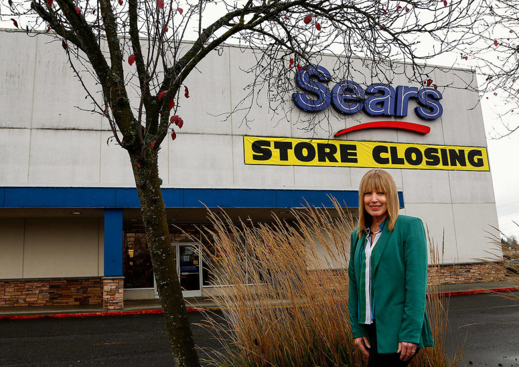 Doreen Ricci visits the Sears store at the Everett Mall Wednesday where at 5 years old, she watched the ceremonial grand opening, including the ribbon-cutting with her late father, Jake Boersema. Her dad worked for Sears in Everett 48 years, becoming the hardware manager. In 1977, he was awarded a trophy for having the No. 1 Sears hardware department in the nation. (Dan Bates / The Herald)
