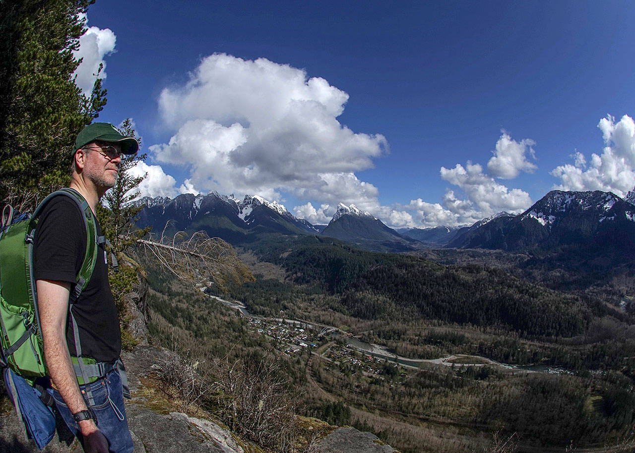 Jonathan Nelson takes in the view from Upper Town Wall at Forks of the Sky State Park near Index. A photographer, Nelson created virtual tours of more than 100 state parks for a new website. (Jonathan Nelson)