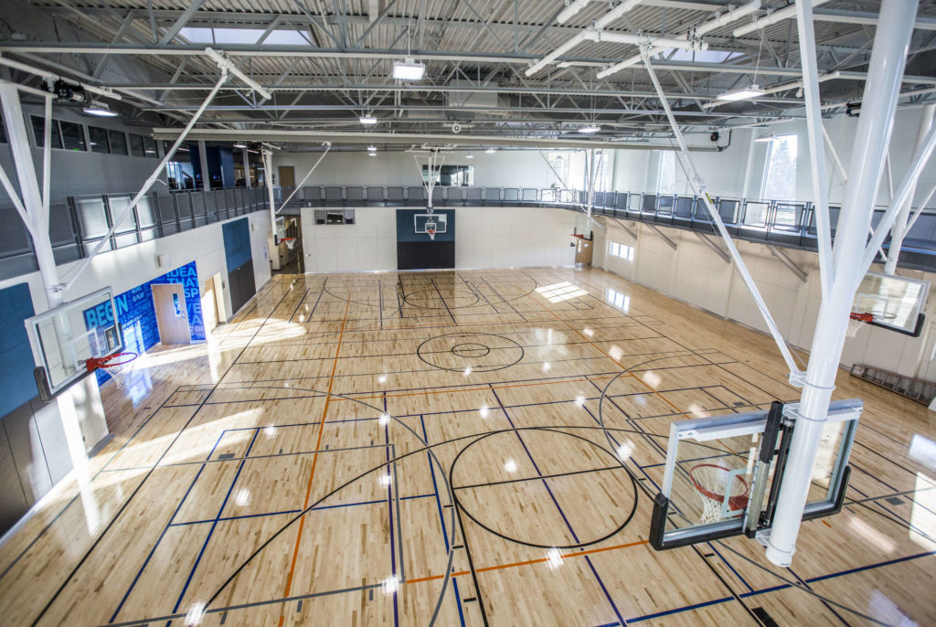 A basketball court and elevated indoor running track at the new Everett YMCA (Olivia Vanni / The Herald)
