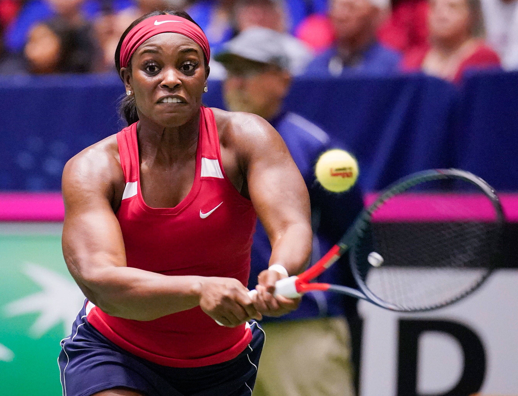 The United States’ Sloane Stephens lines up a return against Switzerland’s Viktorija Golubic during a Fed Cup match April 21, 2019, in San Antonio. (AP Photo/Darren Abate)