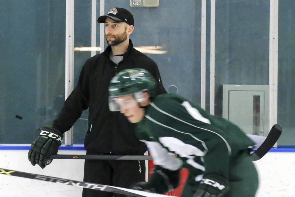 Everett Silvertips assistant coach Mitch Love looks on during a practice session in 2015. (Kevin Clark / Herald file)
