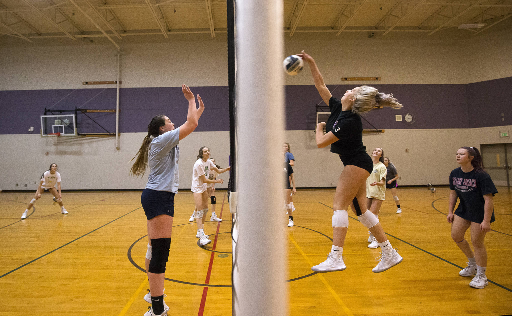 Samaya Morin spikes the ball Wednesday during the Lake Stevens volleyball team’s final practice before heading to Yakima for the Class 4A state tournament. (Andy Bronson / The Herald)