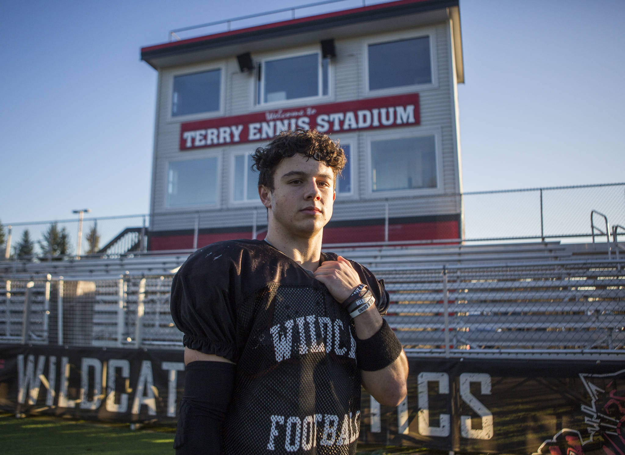 Archbishop Murphy’s Joe Ennis, the grandson of legendary high school football coach Terry Ennis, poses at Terry Ennis Stadium, home of the Wildcats, on Thursday in Everett. (Olivia Vanni / The Herald)