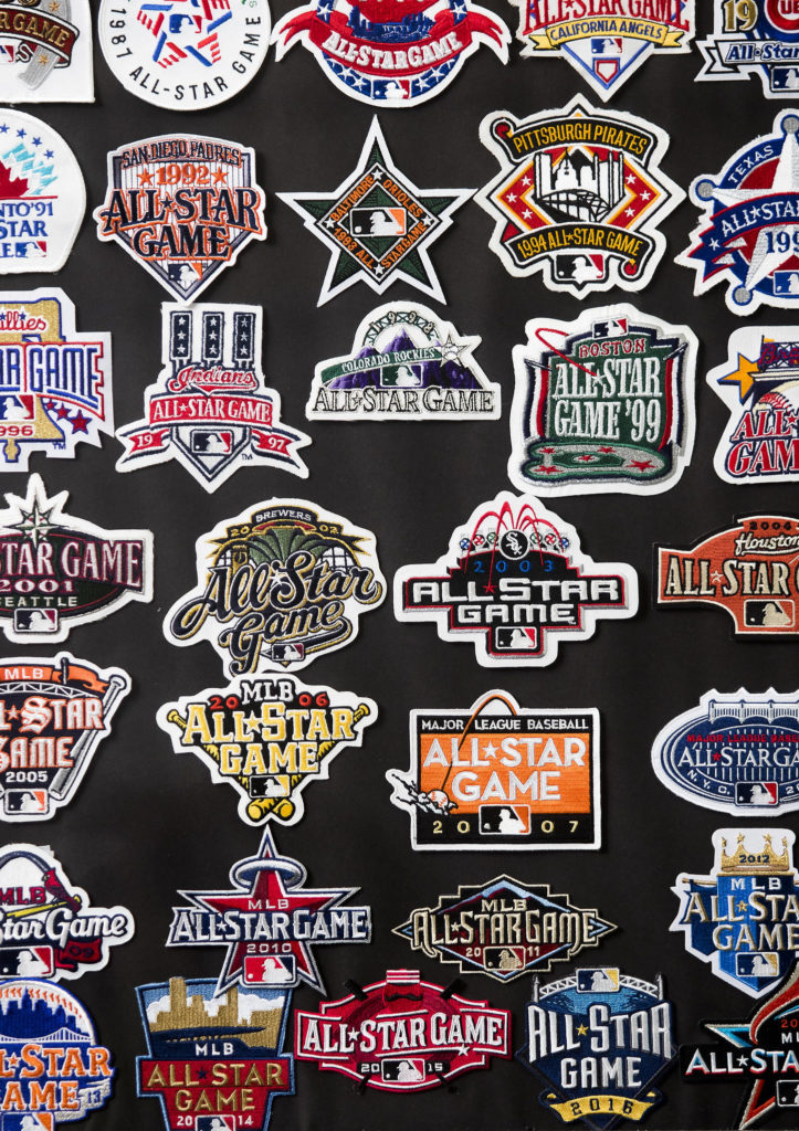 Josh Whall’s game room has a collection of the patches from Major League Baseball’s All-Star games from 1933 to today. (Andy Bronson / The Herald)
