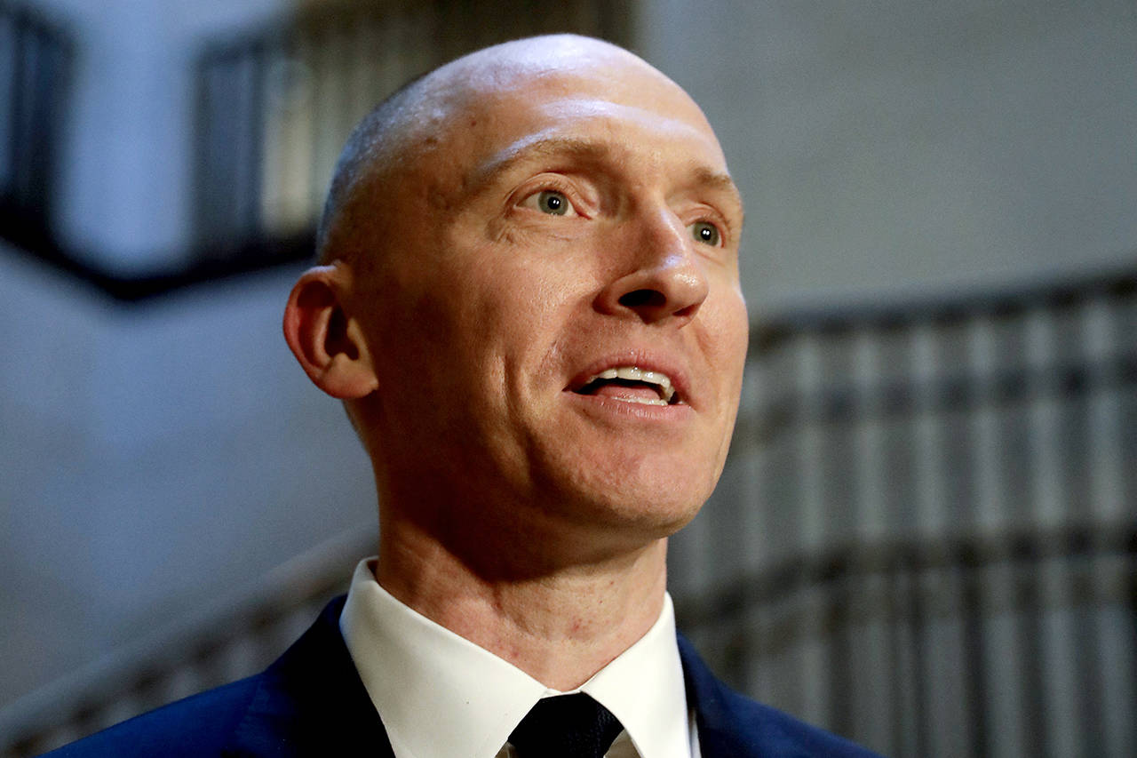 In this 2017 photo, Carter Page, a foreign policy adviser to Donald Trump’s 2016 presidential campaign, speaks with reporters following a day of questions from the House Intelligence Committee, on Capitol Hill in Washington. (AP Photo/J. Scott Applewhite, file)