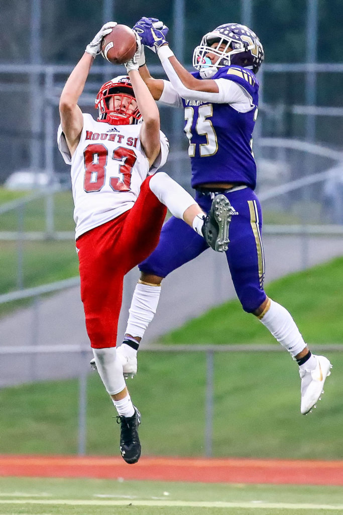 Mount Si’s Stuart DeMerit intercepts a pass intended for Lake Stevens’ Kasen Kinchen Saturday afternoon at Lake Stevens High School on November 23, 2019. Lake Stevens lost to Mount Si, 24-22, ending their state championship run. (Kevin Clark / The Herald)
