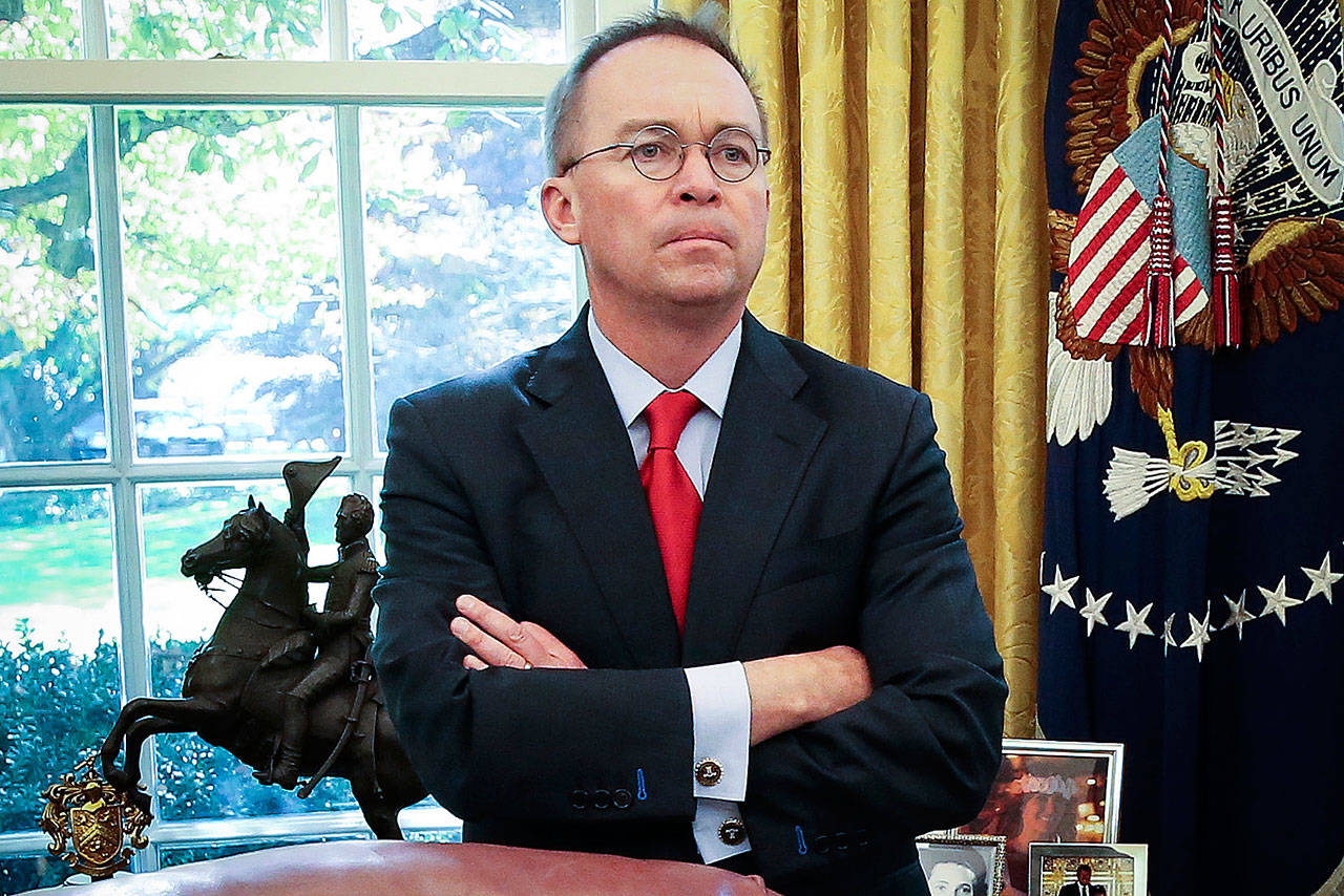 Emails between acting White House chief of staff Mick Mulvaney and White House budget officials indicate the administration was trying to come up with a justification for President Donald Trump’s denial of military aid to Ukraine after the fact. (Washington Post photo)