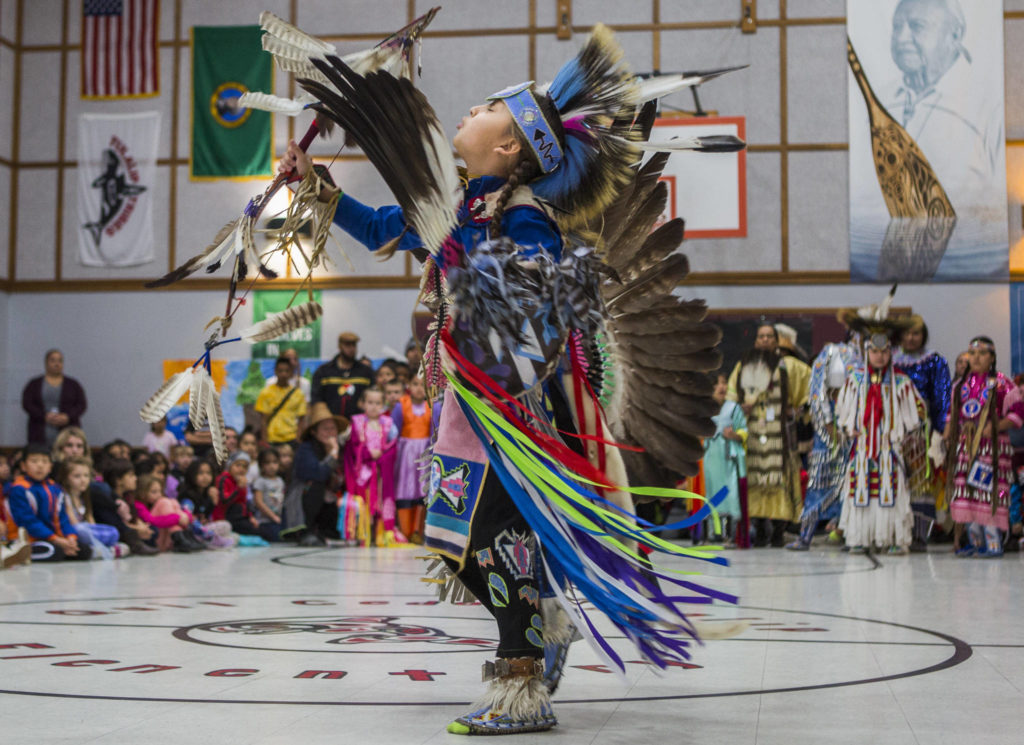 Mason Jefferson, 11, dances during Tulalip Day at Quil Ceda Tulalip Elementary on Wednesday in Tulalip. (Olivia Vanni / The Herald)
