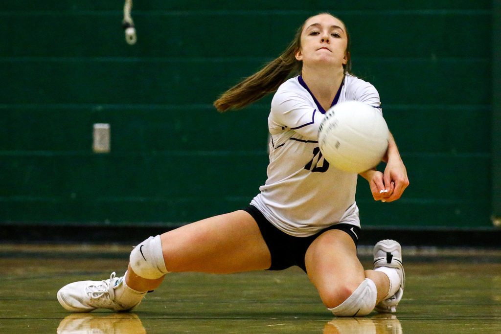 Lake Stevens’ Tatum Smith digs against Mount Si on Nov. 12 at Henry M. Jackson High School Mill Creek. (Kevin Clark / The Herald)
