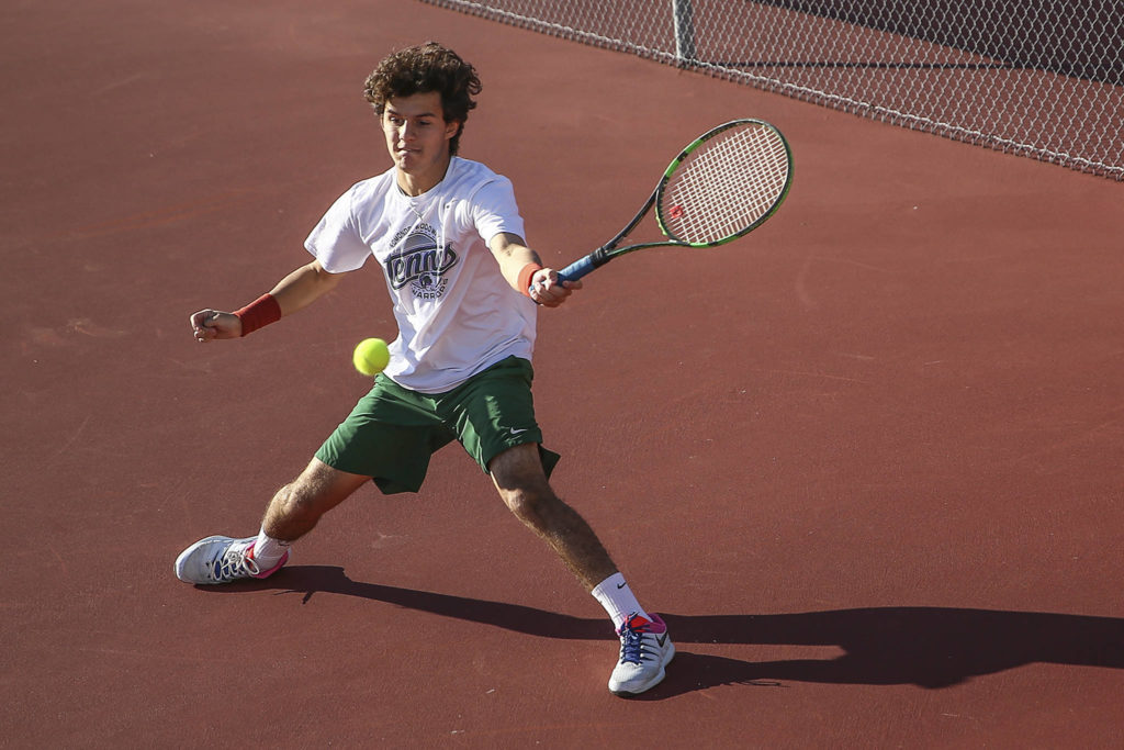Edmonds-Woodway’s Sebastian Fernandez competes in the 3A Boys District Tennis Tournament on Oct. 29 at Arlington High School. (Kevin Clark / The Herald)
