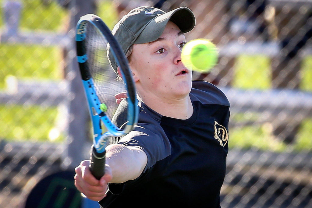 Lynnwood’s Nicolas Desgrippes competes in the 3A Boys District Tennis Tournament on Oct. 29 at Arlington High School. (Kevin Clark / The Herald)

