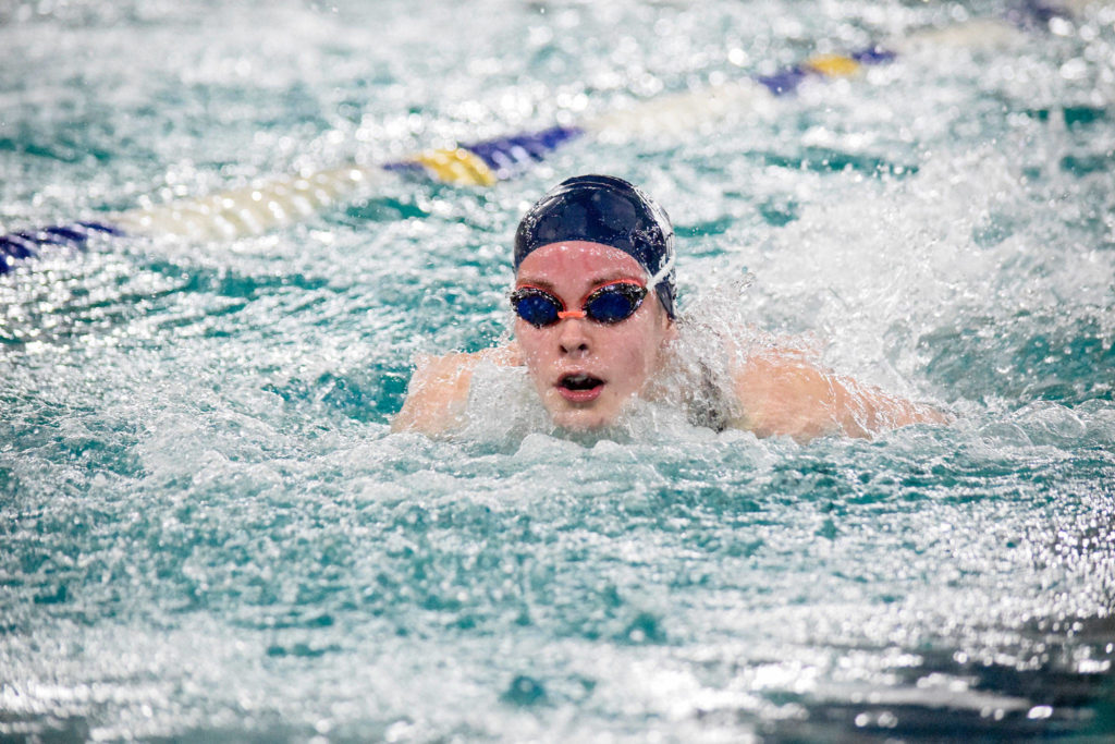 Glacier Peak’s Macy Fidler swims in the girls 100 yard butterfly of the 4A Girls Northwest District Championship on Nov. 9 at the Snohomish Aquatic Center. Fidler won with a time of 57.48. (Katie Webber / The Herald)
