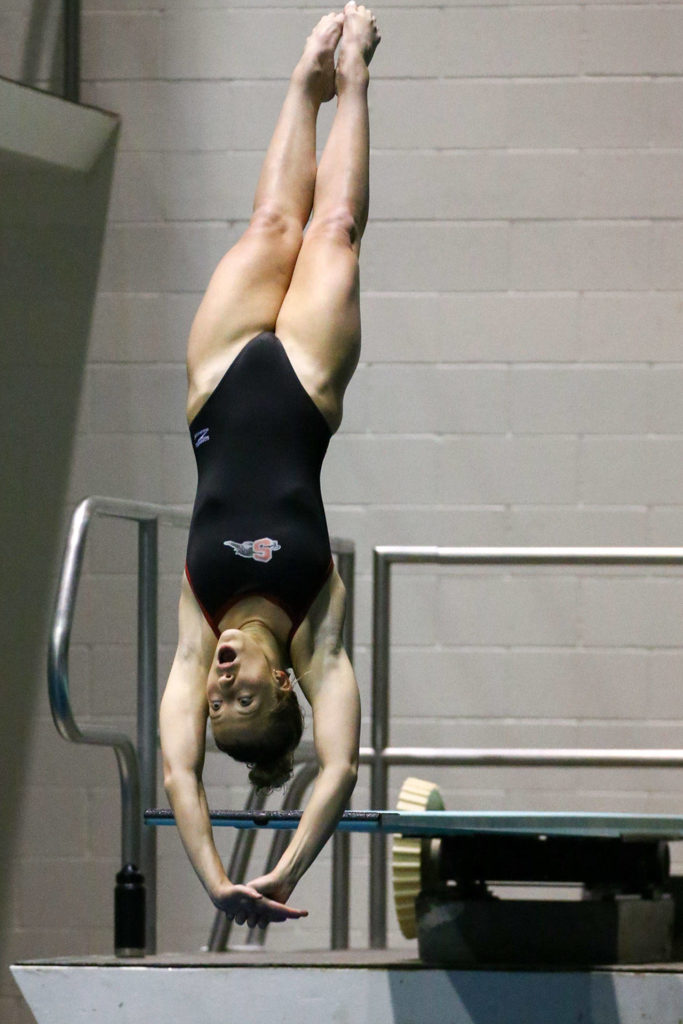 Snohomish’s Kayli Kersavage competes in the 1 meter diving Saturday evening during the 3A Girls Swim & Dive Championship at King County Aquatics Center in Federal Way on November 16, 2019. (Kevin Clark / The Herald)
