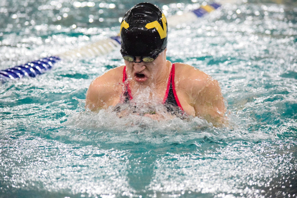 Lake Steven’s Cheyenne Kreide swims in the girls 100 yard breaststroke of the 4A Girls Northwest District Championship on Nov. 9 at the Snohomish Aquatic Center. Cheyenne won with a time of 1:05.62. (Katie Webber / The Herald)
