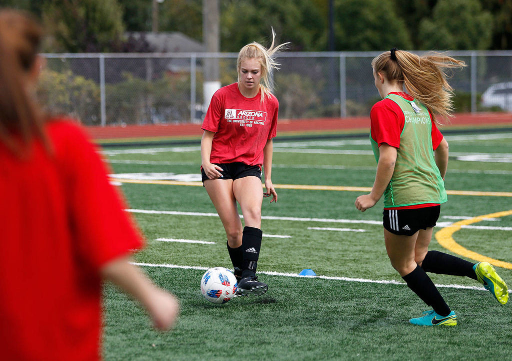Bree Nichols passes the ball during practice at Snohomish High School on Sept. 7, 2018 in Snohomish, Wa. (Olivia Vanni / The Herald)

