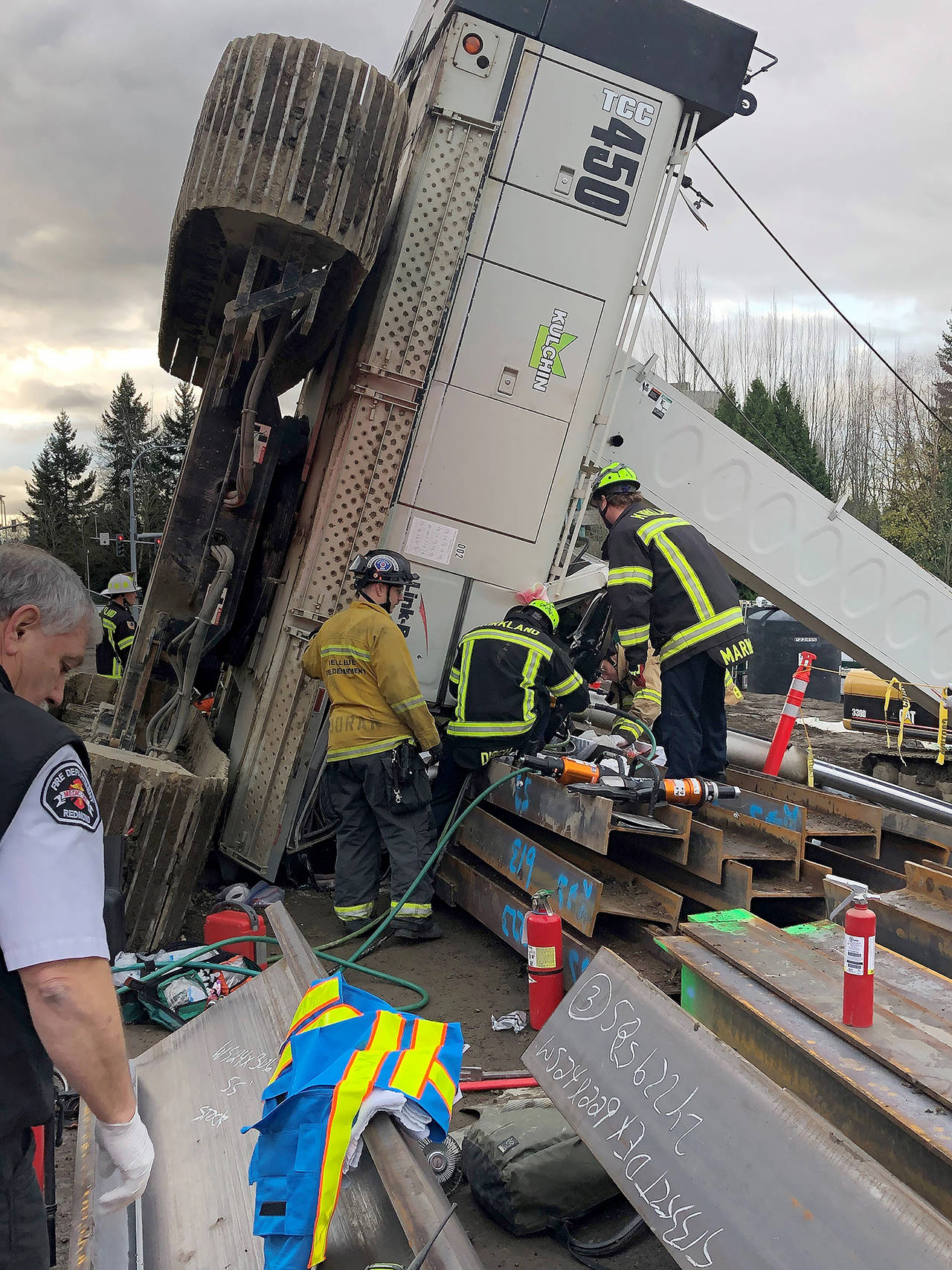 A worker was trapped for an hour inside a mobile crane that tipped over at a Kirkland construction site Monday. (City of Kirkland)