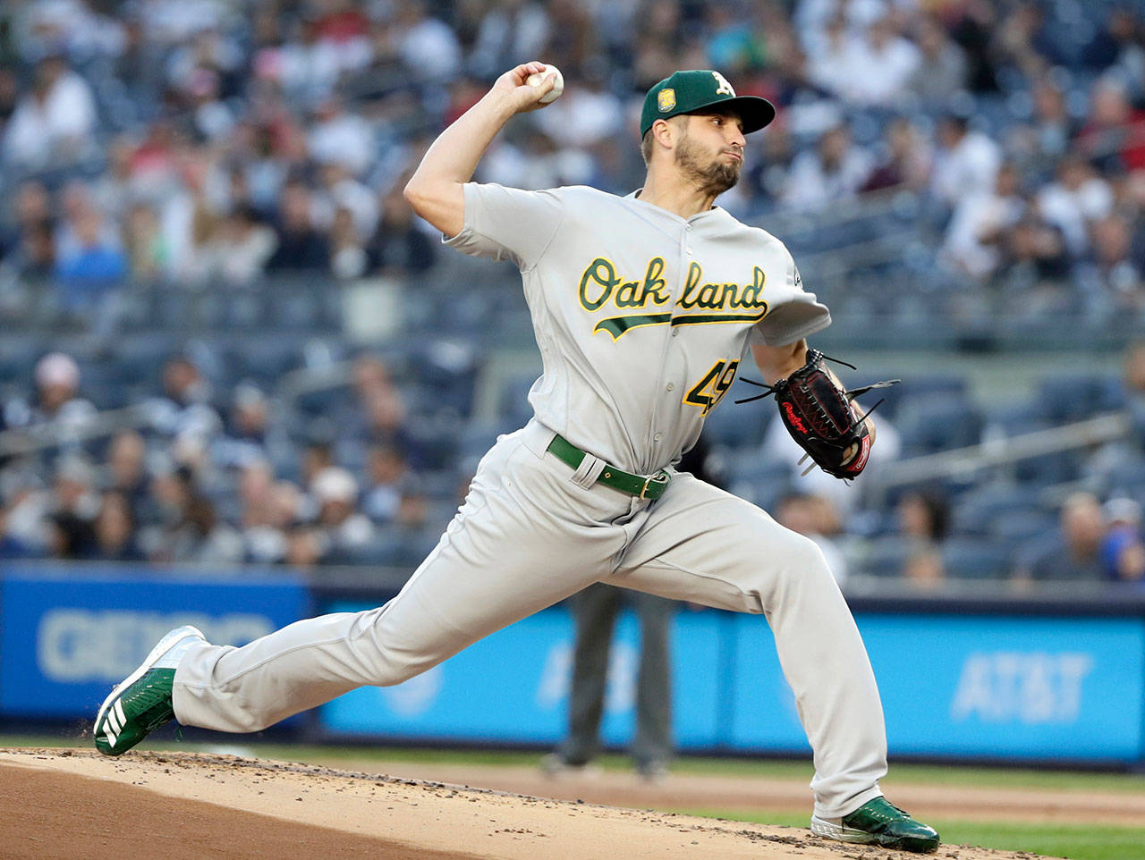 Oakland’s Kendall Graveman pitches in a May 11, 2018 game against the Yankees in New York. Seattle signed Graveman to a 1-year contract Tuesday. (AP Photo/Frank Franklin II, File)