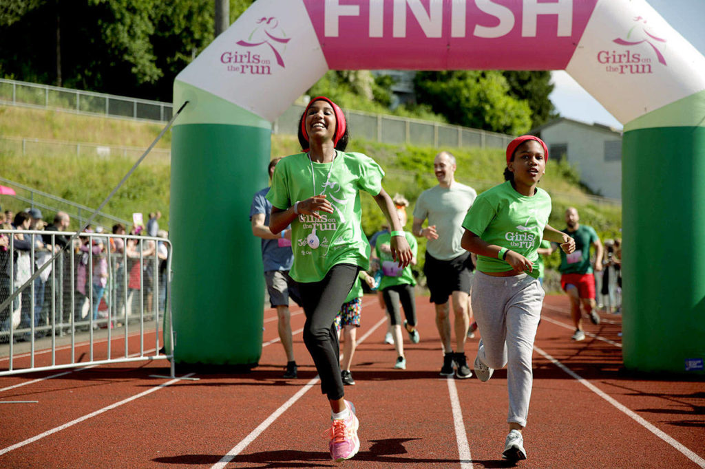 The 10-week Girls on the Run of Snohomish County program ends with a 5K that isn’t a race. Girls move at their on pace. (Girls on the Run)
