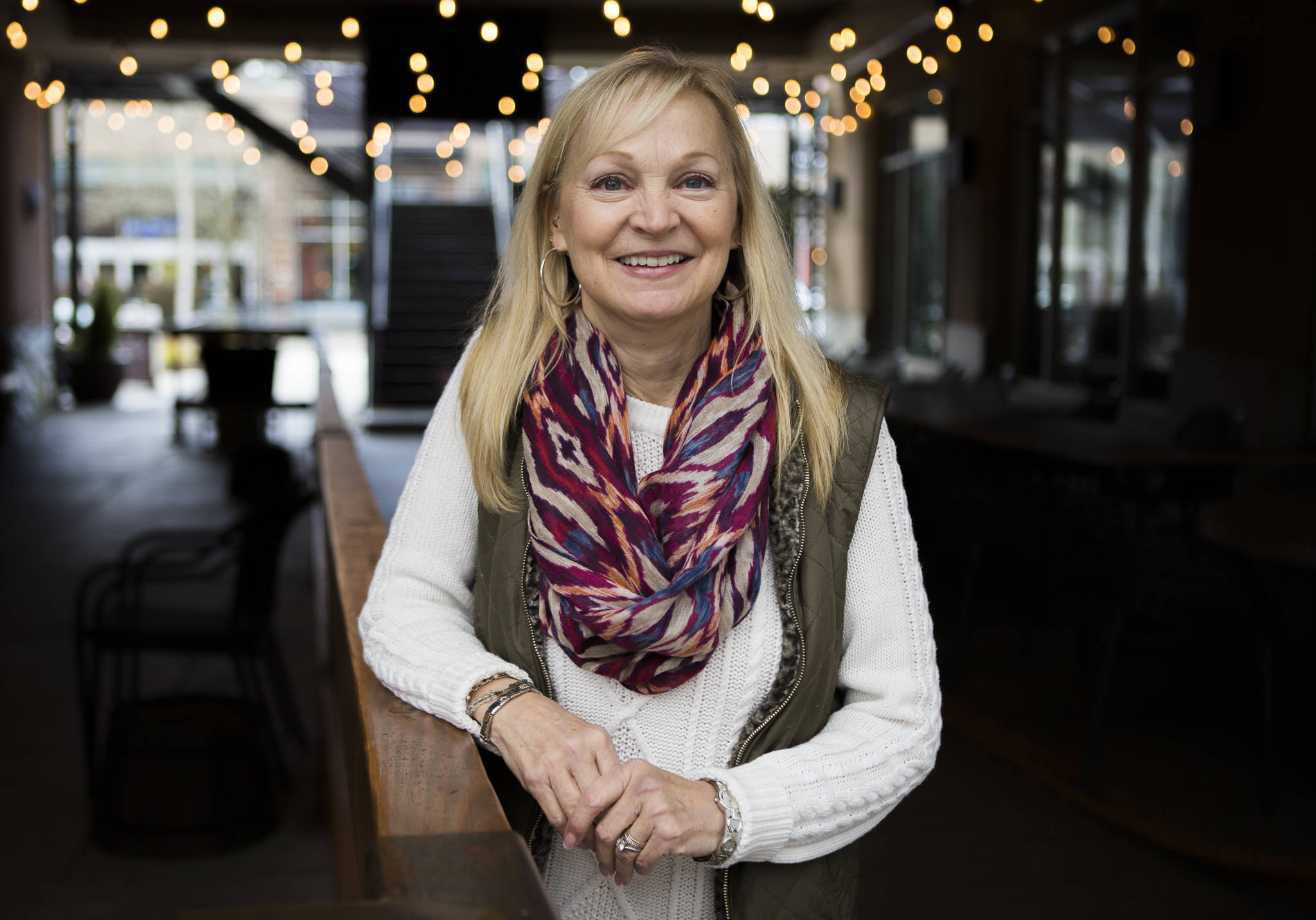 Kelly Howell, 53, of Mill Creek, recently discovered her half-sister Linda Holt through a 23andMe test. Both women share the same biological mother and were adopted at birth by different California families. (Olivia Vanni / The Herald)