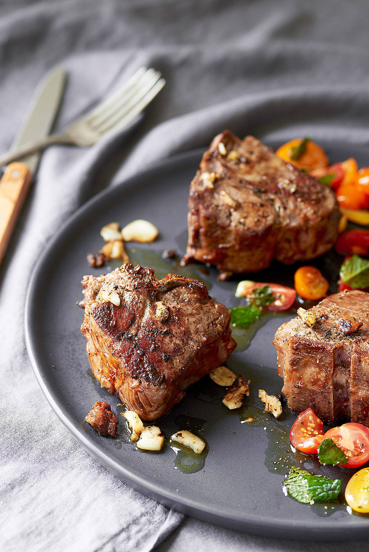 Serve seared lamb chops alongside a tomato and mint slaw and a dollop of plain yogurt. (Photo by Danielle Atkins)