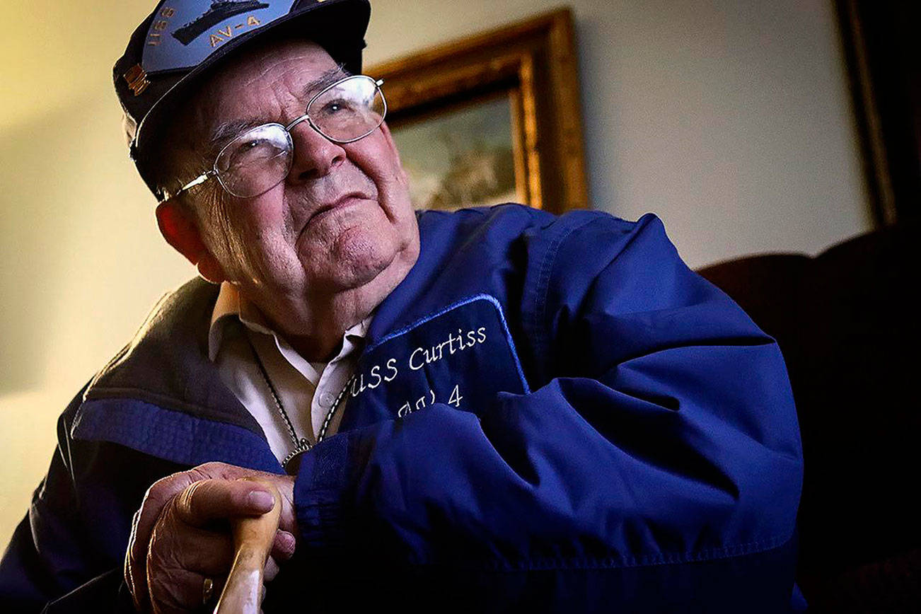Robert Jared Dickson was a sailor aboard the USS Curtiss at Pearl Harbor during the 1941 attack. Here, he shared that experience during a 2016 interview at his Arlington home. He died Oct. 22 at age 98. (Photo Kevin Clark / The Herald)