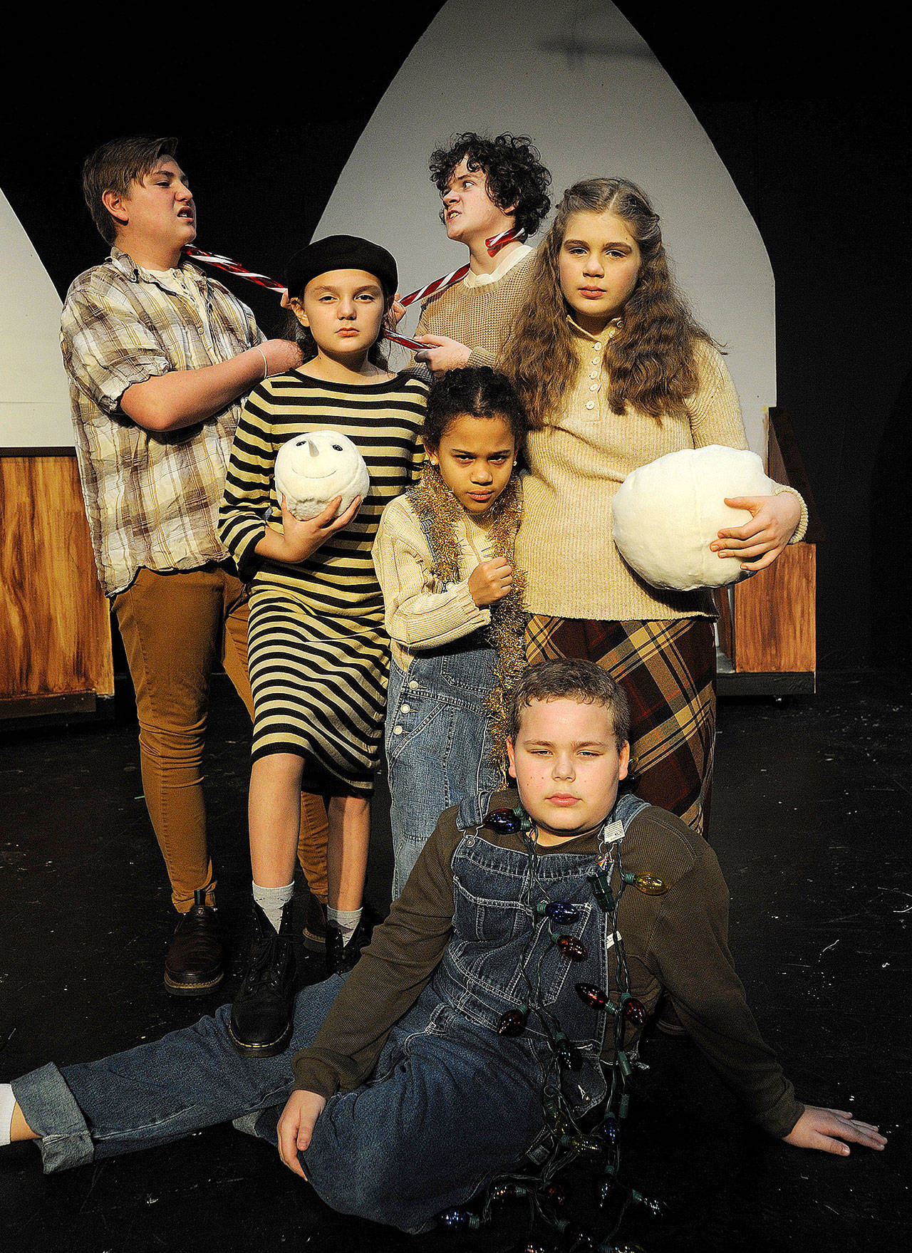 The Herdmans (clockwise from left) Alyx Villalobos, Leif Winter, Annie Brediger, Derek Greene, Michelle Hall, and Amaya Villalobos wreak havoc on Christmas in The Best Christmas Pageant Ever: The Musical, playing at Red Curtain Arts Center in Marysville. (Larry T. Lisk)