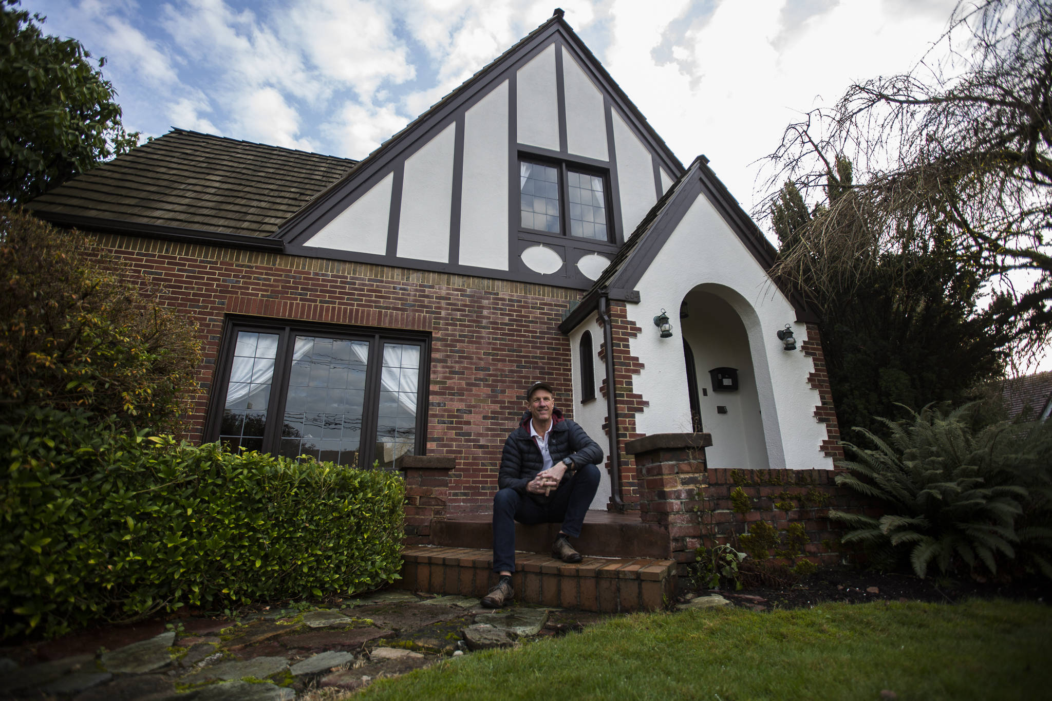 Owner Jeff Amsberry in front of his VRBO home at 604 Main Street on Thursday in Monroe. (Olivia Vanni / The Herald)