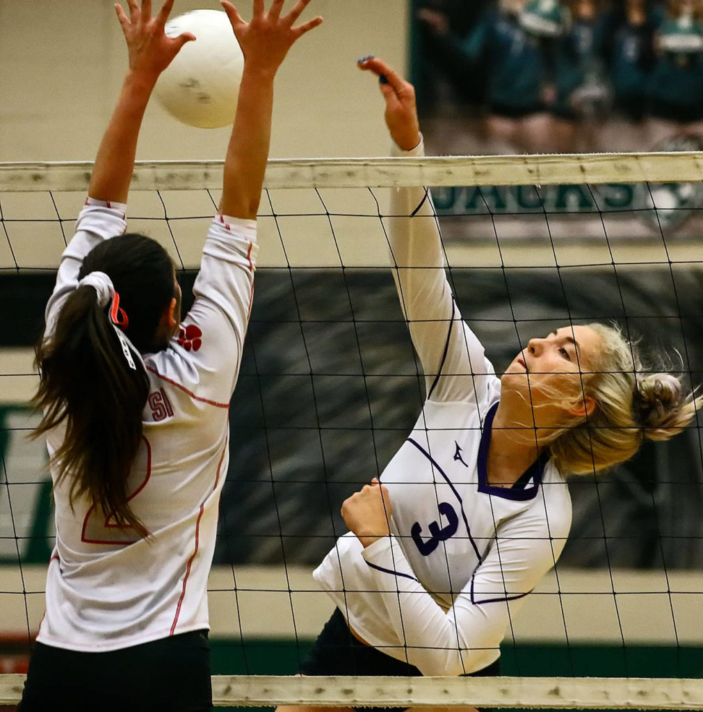 Samaya Morin delivers one of her crushing spikes. (Kevin Clark / The Herald)
